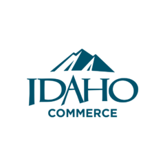 A stylized logo featuring a mountain range and the text 'IDAHO COMMERCE'