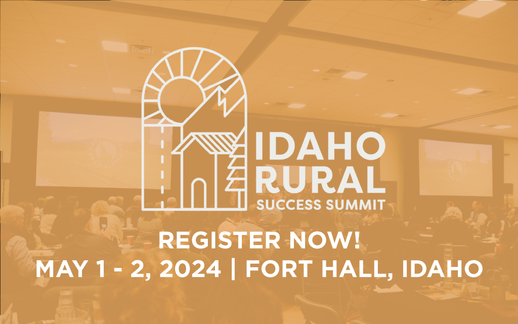 A conference room filled with attendees at the Idaho Rural Success Summit, with registration details overlaid