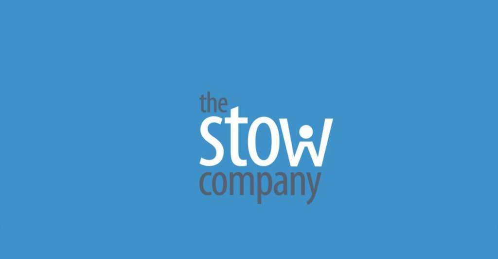 A minimalist logo featuring the text 'the stow company' on a blue background