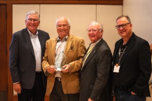 From left: Lt. Gov. Scott Bedke, Carl Wilgus, recipient of the 2026 Governor’s Lifetime Achievement Award in Recreation and Tourism, Idaho Commerce Director Tom Kealey and Tourism and Marketing Administrator Jeremy Chase.